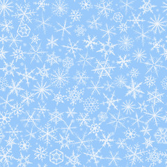 Seamless background with beautiful various snowflakes.