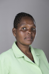 Portrait of a black middle aged woman making facial expressons