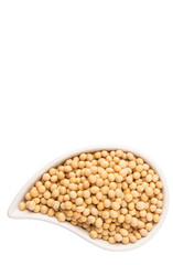 Soybean in an oval ceramic bowl over white background