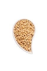 Soybean in an oval ceramic bowl over white background