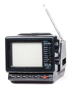 Old handheld radio and television set isolated