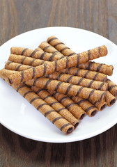 Wafer Roll with chocolate flavour cream and cocoa coating