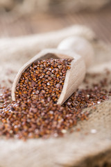 Wooden spoon with red Quinoa