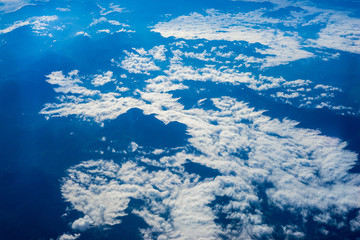 Fototapeta premium The View from the plane above the cloud and sky
