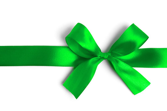 Green ribbon bow on white background