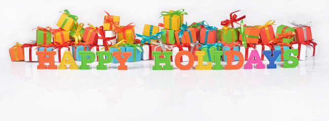 Happy holidays colorful text on the background of gifts