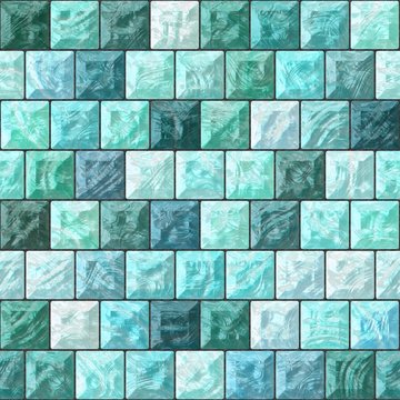 The pattern from the glass blocks in blue and green.