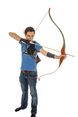 Boy shooting with bow and arrow - 72932593