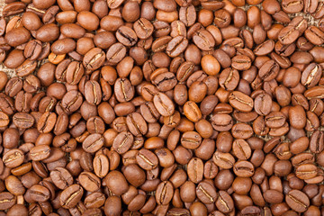 Coffee beans on wooden table