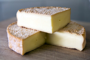 Close up yellow soft cheese