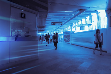 crowd silhouette of people inside modern railway hub building