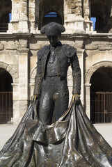 Statue of famous bullfighter in front of the arena in Nimes