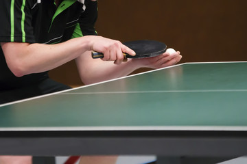 table tennis player serving