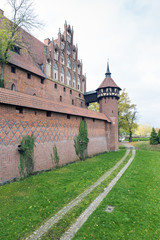 Fototapeta na wymiar Medieval Malbork castle on the river Nogat