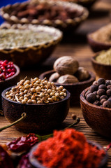 Colorful theme with spices on wooden table