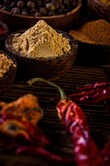 Wooden table of traditional Asian spices