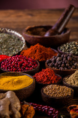 Wooden table of traditional Asian spices