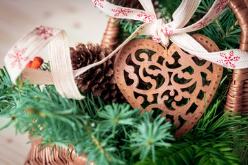 Patterned Christmas heart. Christmas decor in a basket.