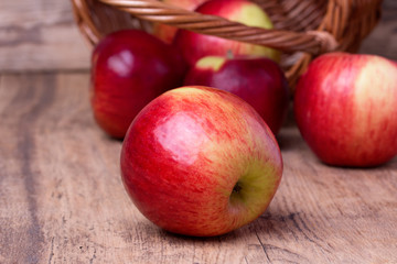 Sweet apples on wooden background
