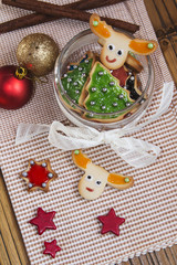 Christmas handmade cookies on wooden background