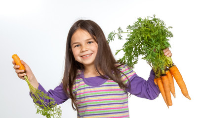 Beautiful little childl with vegetable