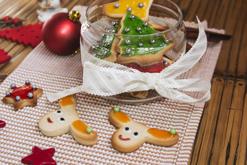 Christmas handmade cookies on wooden background