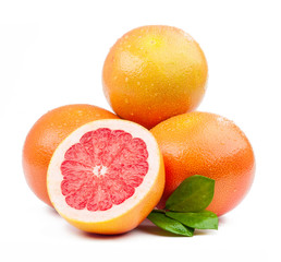 three grapefruit and slice with leaves isolated