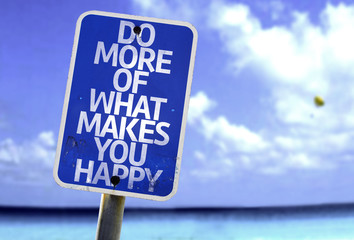 Do What Makes You Happy sign with a beach on background