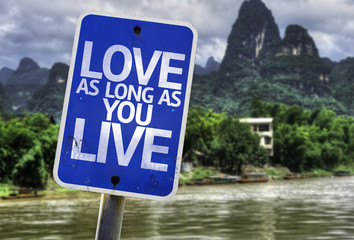 Love As Long As You Live sign with a exotic background