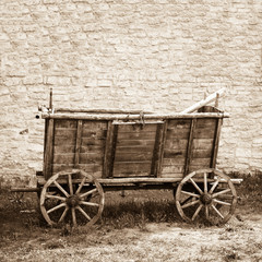 Fototapeta na wymiar Empty and old wooden cart