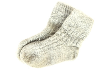 Pair of gray knit wool socks isolated on white