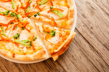 pizza on wooden background