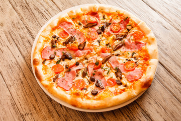 pizza on wooden background