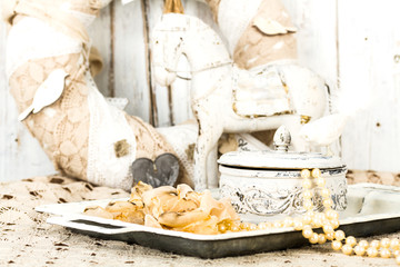 romantic background with roses, pearls necklace, old lace