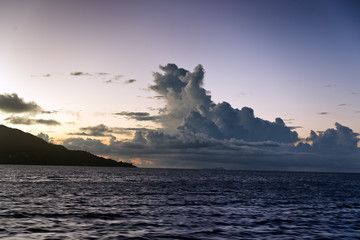 Colorful sunset behind cumulonimbus clouds
