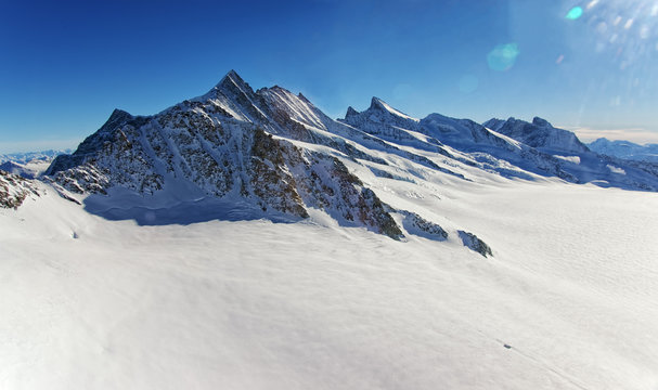 Swiss Aletch glacier helicopter view in winter