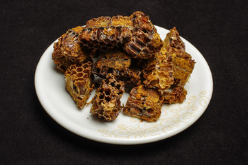 Bee bread in the bits of honeycomb