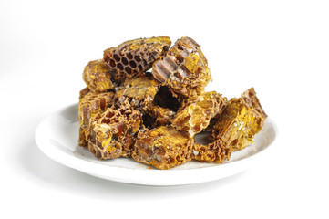 Pile of bee pollen or bee bread in the plate