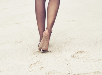 Woman Feet While Walking at White Beach Sand