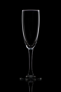 Champagne glass on black