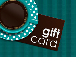 coffee with gift card lying on tablecloth