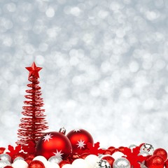 Christmas border of red and white ornaments on silver background