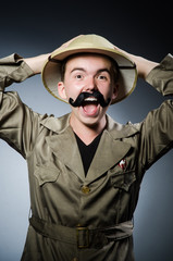 Man in safari hat in hunting concept