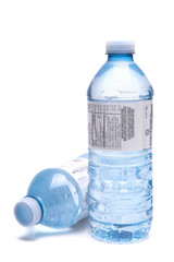 Bottled water close up shot isolated on the white background, sh