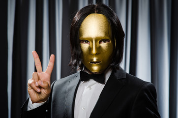 Funny concept with theatrical mask