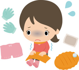 冷え性の女性と防寒グッズ