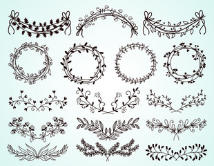 Set of hand-drawn floral borders and wreaths