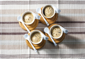 cups of coffee on place mats