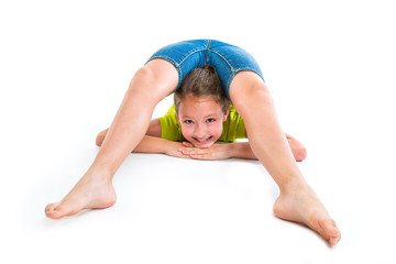 Flexible contortionist kid girl playing on white