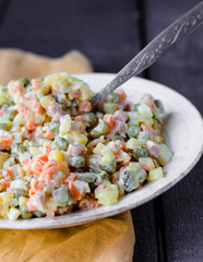 Olivier salad a festive table, new year